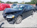 2012 Volkswagen Passat — photo 2 of 17 | VIN 1VWAP7A35CC048482