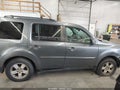 2011 Honda Pilot — photo 13 of 16 | VIN 5FNYF4H5XBB076614