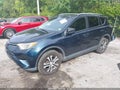 2018 Toyota RAV4 — photo 2 of 16 | VIN JTMZFREV0JJ201052