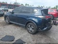 2018 Toyota RAV4 — photo 3 of 16 | VIN JTMZFREV0JJ201052