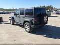 2015 Jeep Wrangler Unlimited — photo 3 of 16 | VIN 1C4BJWDG3FL727009