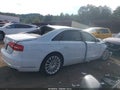 2015 Audi A8 — photo 13 of 16 | VIN WAU32AFD9FN029187
