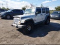 2011 Jeep Wrangler Unlimited — photo 2 of 15 | VIN 1J4BA3H10BL596923
