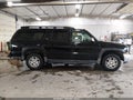 2005 Chevrolet Suburban 1500 — photo 13 of 16 | VIN 3GNFK16Z35G249421