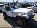 1989 Jeep Wrangler — photo 1 of 11 | VIN 2J4FY19EXKJ167412