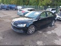 2013 Volkswagen Jetta — photo 2 of 16 | VIN 3VWBP7AJ1DM387615