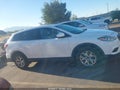2014 Mazda CX-9 — photo 13 of 16 | VIN JM3TB3CVXE0429371