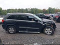 2012 Jeep Grand Cherokee — photo 13 of 16 | VIN 1C4RJFAG8CC219729
