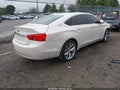 2014 Chevrolet Impala — photo 4 of 22 | VIN 1G1125S37EU115965
