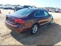 2013 Volkswagen Passat — photo 4 of 16 | VIN 1VWBP7A36DC032037