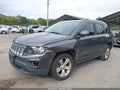 2015 Jeep Compass — photo 2 of 16 | VIN 1C4NJDEBXFD130714