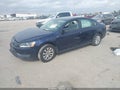 2015 Volkswagen Passat — photo 2 of 15 | VIN 1VWAT7A38FC049190