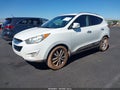 2010 Hyundai Tucson — photo 2 of 11 | VIN KM8JUCAC1AU064489