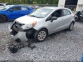 2013 Kia Rio — photo 2 of 16 | VIN KNADM5A38D6852205