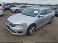 2014 Volkswagen Passat — photo 2 of 11 | VIN 1VWBN7A31EC027304