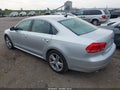 2014 Volkswagen Passat — photo 3 of 11 | VIN 1VWBN7A31EC027304