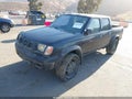 2000 Nissan Frontier — photo 2 of 11 | VIN 1N6ED27T4YC306549
