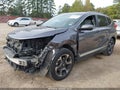 2017 Honda CR-V — photo 2 of 18 | VIN 7FARW1H90HE035329