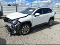 2020 Toyota RAV4 — photo 2 of 17 | VIN 2T3C1RFV9LW095353