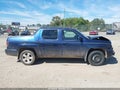 2013 Honda Ridgeline — photo 12 of 15 | VIN 5FPYK1F56DB005000