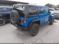 2015 Jeep Wrangler Unlimited — photo 4 of 18 | VIN 1C4BJWFGXFL769335