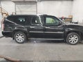 2009 GMC Yukon XL — photo 14 of 17 | VIN 1GKFK162X9J102095