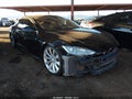 2013 Tesla Model S — photo 1 of 15 | VIN 5YJSA1CPXDFP21048