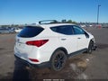 2017 Hyundai Santa Fe — photo 4 of 16 | VIN 5XYZWDLA6HG479807