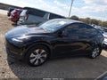 2023 Tesla Model Y — photo 14 of 18 | VIN 7SAYGDEE4PA058957