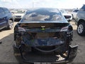 2023 Tesla Model Y — photo 16 of 18 | VIN 7SAYGDEE4PA058957
