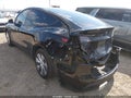 2023 Tesla Model Y — photo 3 of 18 | VIN 7SAYGDEE4PA058957