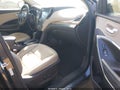 2016 Hyundai Santa Fe — photo 5 of 16 | VIN 5XYZU3LB3GG328186
