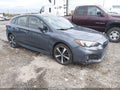 2017 Subaru Impreza — photo 1 of 16 | VIN 4S3GTAL65H3745459