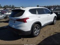 2022 Hyundai Santa Fe — photo 4 of 16 | VIN 5NMS14AJ5NH372820