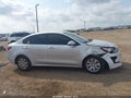 2022 Kia Rio — photo 13 of 16 | VIN 3KPA24AD2NE510601