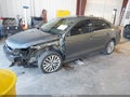 2014 Volkswagen Jetta — photo 2 of 12 | VIN 3VWL17AJ7EM440714