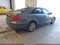 2014 Volkswagen Jetta — photo 4 of 12 | VIN 3VWL17AJ7EM440714