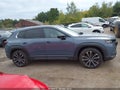 2023 Mazda CX-50 — photo 13 of 16 | VIN 7MMVABEY8PN121305