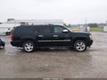 2009 Chevrolet Suburban 1500 — photo 13 of 16 | VIN 1GNFK36349R296163
