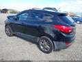 2015 Hyundai Tucson — photo 3 of 17 | VIN KM8JUCAG2FU030653