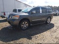 2011 Nissan Armada — photo 2 of 11 | VIN 5N1BA0NE1BN614504