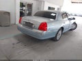 2005 Lincoln Town Car — photo 4 of 16 | VIN 1LNHM81W15Y654423