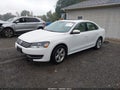2013 Volkswagen Passat — photo 2 of 19 | VIN 1VWBP7A37DC039434
