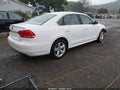 2013 Volkswagen Passat — photo 4 of 19 | VIN 1VWBP7A37DC039434