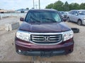 2012 Honda Pilot — photo 12 of 16 | VIN 5FNYF4H95CB065492