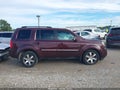 2012 Honda Pilot — photo 13 of 16 | VIN 5FNYF4H95CB065492