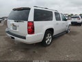2014 Chevrolet Suburban 1500 — photo 4 of 18 | VIN 1GNSCJE02ER184107