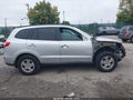 2011 Hyundai Santa Fe — photo 12 of 15 | VIN 5XYZGDAB9BG004815