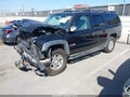 2005 Chevrolet Suburban 1500 — photo 2 of 12 | VIN 3GNFK16Z05G184320