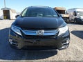 2018 Honda Odyssey — photo 12 of 16 | VIN 5FNRL6H96JB071811